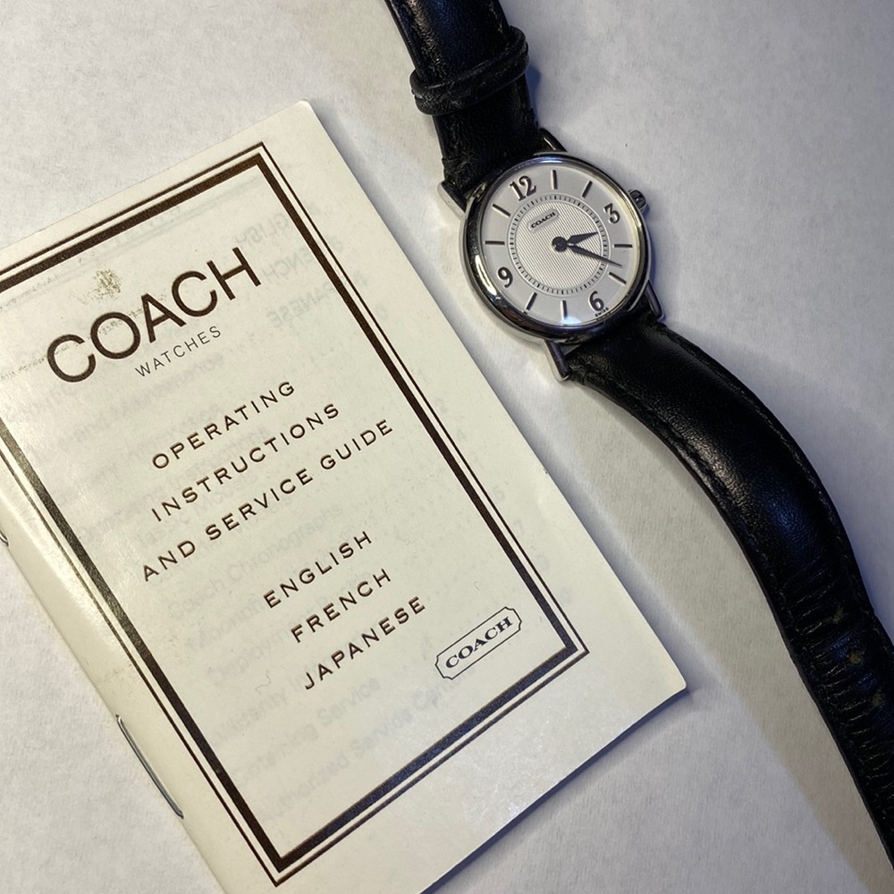 Coach watch 807 with black leather strap.